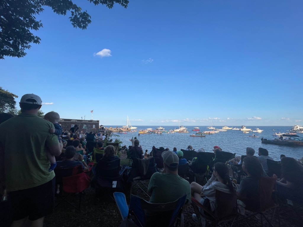 View from Glensheen of the pier and lake. A lot of people were pictured watching the stage.