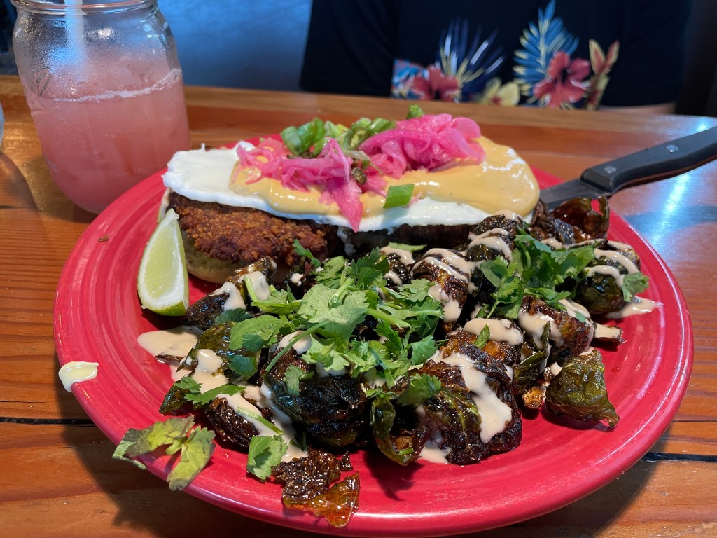 Fried fish with wild rice benny and a side of fried Brussel sprouts