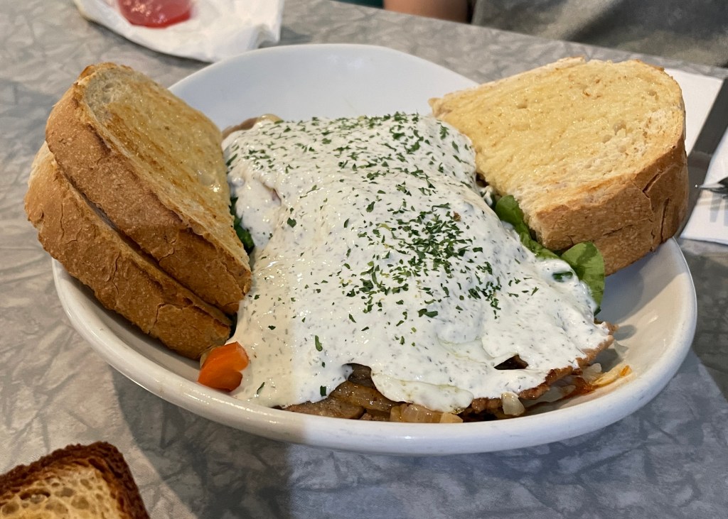 The Greek skizzle: turkey, spinach, tomatoes, eggs, and a whole lot of tzatziki sauce